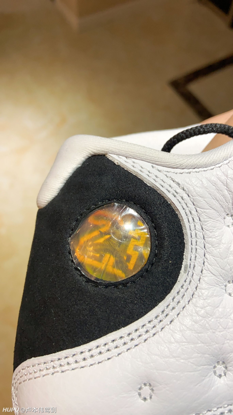 aj13右脚猫眼是歪的